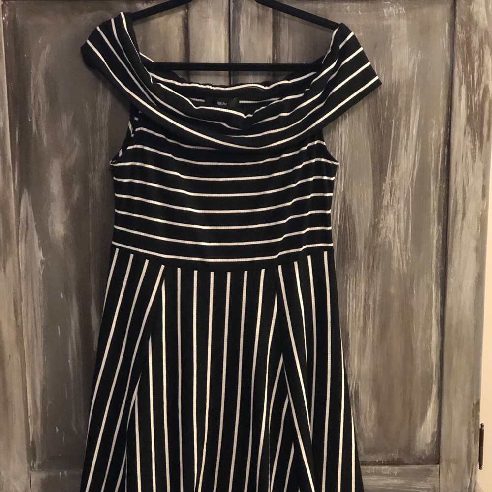 Off the shoulder, black and white midi dress.